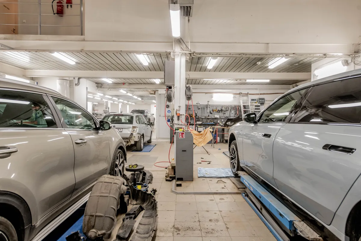 A spacious network garage with several vehicles serviced at once
